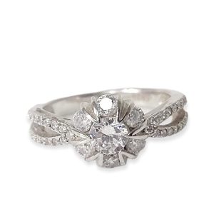 ANILLO EN FORMA DE FLOR CON CIRCONIAS BLANCAS 1-07775