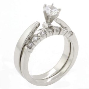 JACKET ANILLO LISO CON UNA CIRCONIA ABIERTO A LOS LADOS Y ARGOLLA CON SIETE CIRCONIAS 1-07905