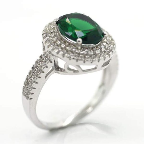 ANILLO OVALADO CON CIRCONIA VERDE Y MICRO CIRCONIAS BLANCAS 1-09811 2 ANILLO OVALADO CON CIRCONIA VERDE Y MICRO CIRCONIAS BLANCAS 1-09811