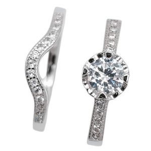 ANILLO JACKET CON MONTURA BAJA PLANO Y ARGOLLA CON ONDA QUE ENLAZA CON EL ANILLO 1-11350