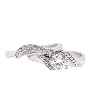 ANILLO JACKET CON CIRCONIA REDONDA CON BOLITAS A LOS LADOS Y ARGOLLA ONDULADA CON CIRCONIAS 1-12249