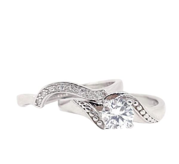 ANILLO JACKET CON CIRCONIA REDONDA CON BOLITAS A LOS LADOS Y ARGOLLA ONDULADA CON CIRCONIAS 1-12249 2 ANILLO JACKET CON CIRCONIA REDONDA CON BOLITAS A LOS LADOS Y ARGOLLA ONDULADA CON CIRCONIAS 1-12249