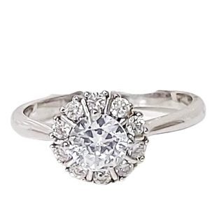 ANILLO CON CIRCONIA BLANCA REDONDA  CON CIRCONIAS ALREDEDOR 1-10333