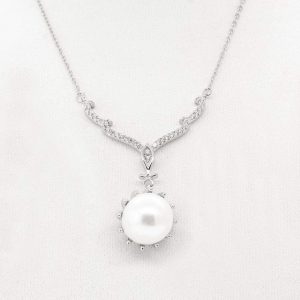 GARGANTILLA CON PERLA DE RIO CON FLOR DE CIRCONIAS ABAJO 1-10619