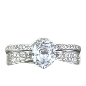 JACKET CON CIRCONIA REDONDA CON 4 GANCHOS Y ARGOLLA CON CURVA QUE ENLAZA EN LA CIRCONIA 1-11833