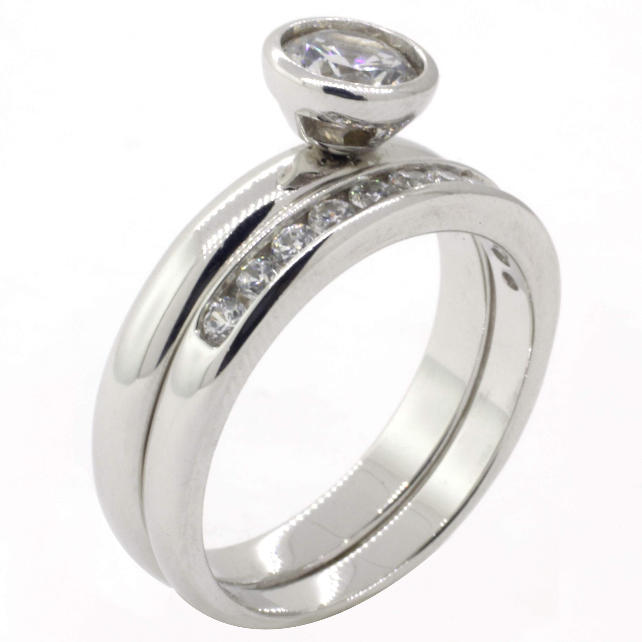 JACKET DE PLATA LA ARGOLLA CON CIRCONIAS Y EL ANILLO CON UNA CIRCONIA REDONDA ALTA CON ORILLA LISA 1-05316 2 JACKET DE PLATA LA ARGOLLA CON CIRCONIAS Y EL ANILLO CON UNA CIRCONIA REDONDA ALTA CON ORILLA LISA 1-05316