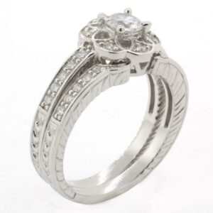 JACKET ANILLO CON CIRCONIA EN FORMA DE FLOR Y CIRCONIAS AL REDEDOR Y ARGOLLA AJUSTABLE CON CIRCONIAS 1-07581
