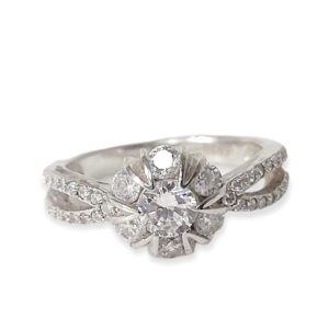 ANILLO EN FORMA DE FLOR CON CIRCONIAS BLANCAS 1-07775